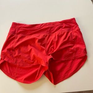 Lululemon speed up 4” MR lined neon samon (the tag says color: CRNR) size 10.